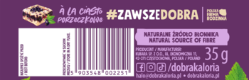 Tył purpurowego opakowania batona Dobra Kaloria Porzeczkowego 35g, kod kreskowy i napis 'Natural Source of Fibre'.