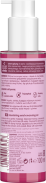Tył różowej butelki olejku Bielenda Cherry Plump z białą pompką, zbliżenie na etykietę ze składem.
