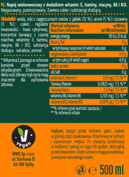Tył pomarańczowej butelki napoju multiwitamino-owocowego 500ml, z polską etykietą i tabelą wartości odżywczych.
