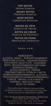 Tył opakowania perfum Boss z pełnym składem, nutami zapachowymi i krajem produkcji na ciemnym tle.