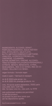 Tył opakowania wody perfumowanej Cosmic Kylie Jenner. Biały tekst ze składnikami i danymi producenta na purpurowym tle.
