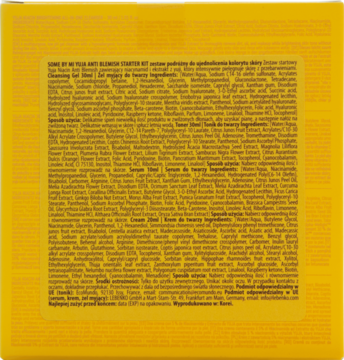 Tył żółtego opakowania zestawu Yuja Niacin Anti Blemish Starter Kit z drobnym tekstem o niacynamidzie i yuji.