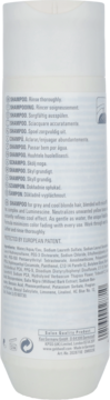 Tył białej butelki Goldwell Dualsenses Silver Shampoo do włosów siwych, widoczne instrukcje i składniki, neutralizuje żółte tony.