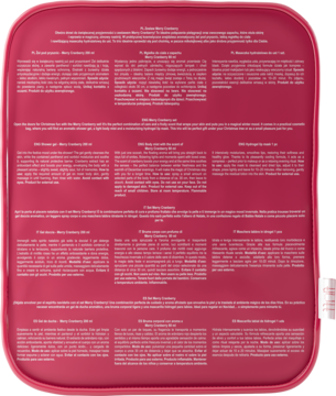 Miękka, różowa kosmetyczka Fluff Merry Cranberry, element zestawu świątecznego, z etykietą tekstową na froncie.