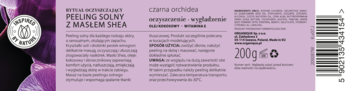 Tył opakowania peelingu solnego Organique Black Orchid z masłem shea 200g, widoczne informacje i kod kreskowy.