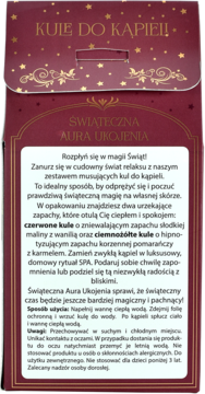 Tył ciemnoczerwonego opakowania świątecznych kul do kąpieli o zapachu maliny i pomarańczy z karmelem.
