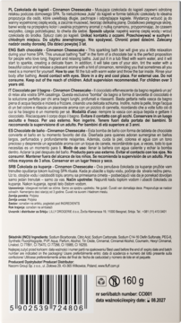 Tył kartonowego opakowania kąpielowej babeczki Nacomi Cinnamon Cheesecake, z kodem EAN i etykietami w wielu językach.