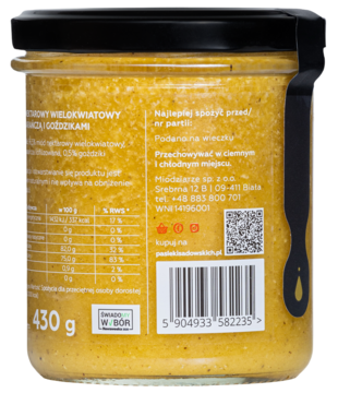 Tył szklanego słoika miodu z pomarańczą i goździkami, żółta zawartość, widoczne etykiety i kod kreskowy.