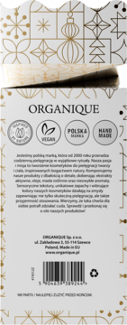 Tył opakowania kosmetyku Organique, biały z eleganckim złotym wzorem świątecznym. Widoczne logo vegan, handmade i kod kreskowy.