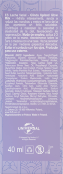 Tył fioletowego opakowania mleczka Glinda Upland Glow Milk 40 ml, z czytelną hiszpańską instrukcją, pełną listą składników i ikonami produktu.