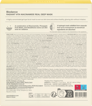 Tył beżowego opakowania Biodance Radiant Vita Niacinamide Real Deep Mask z tekstem składu i instrukcji.