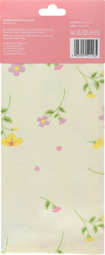 Ścierka kuchenna Green Bloom w kremie z żółto-różowymi kwiatami, złożona, z różowym opakowaniem na górze.