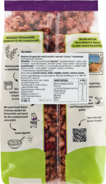 Tył opakowania Alnatura Bio musli crunchy owocowe, z etykietą o składzie i wartościach odżywczych.