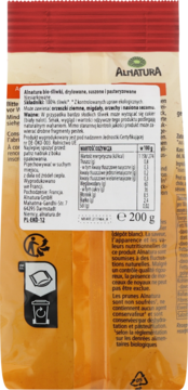 Tył pomarańczowego opakowania Alnatura bio-śliwek drylowanych, z białymi etykietami składu i wartości odżywczych.