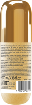 Tył złotego eliksiru rozświetlającego ULTRA ILLUMINATING ELIXIR 100ml z widoczną beżową etykietą, opisem, i kodem kreskowym.