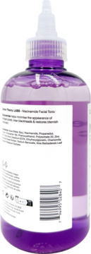 Tył fioletowej butelki toniku do twarzy Carbon Theory Niacinamide z białą etykietą i kodem kreskowym.