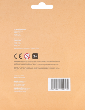 Tył jasnobeżowego opakowania produktu dla dzieci, z kodem kreskowym, symbolem CE i ostrzeżeniami.