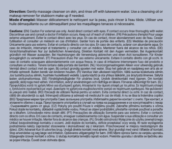 Zbliżenie na białą etykietę z czarnym tekstem: instrukcje użycia i ostrzeżenia produktu kosmetycznego w wielu językach.