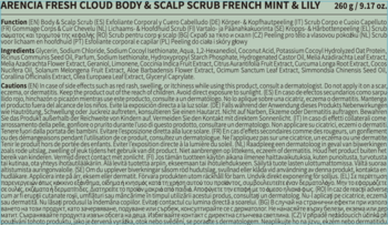 Zbliżenie etykiety Arencia Fresh Cloud Body & Scalp Scrub French Mint & Lily, na zielonkawo-niebieskim tle z białym tekstem.