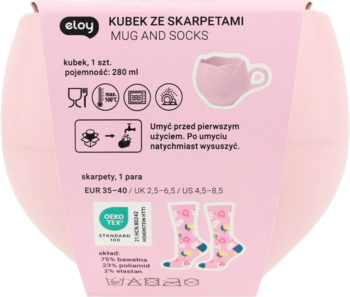 Eloy zestaw: różowy kubek (280 ml) i wzorzyste skarpety (EUR 35-40) w pastelowym opakowaniu, widok z góry.