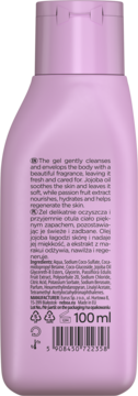 Tył jasnoróżowej butelki żelu do mycia ciała z jojoba i marakują, z tekstem opisującym działanie i skład, kod kreskowy.