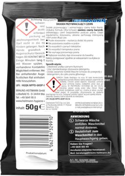 Tył czarnego opakowania Heitmann, środek przywracający czerń tkanin, z instrukcjami i kodem kreskowym.