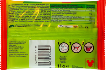 Tył zielonego opakowania wafli Lilo&Stitch z tatuażem na język, widoczną instrukcją użycia, kodem kreskowym i danymi odżywczymi. 11g.