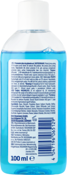 Tył niebieskiego płynu do płukania ust 100 ml Rossmann, z białym wieczkiem, widoczne składniki i kod kreskowy.