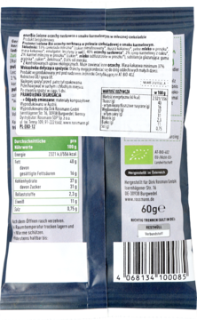 Tył ciemnoniebieskiej torebki Rossmann: melon w mlecznej czekoladzie, etykiety, wartości odżywcze, kod kreskowy.