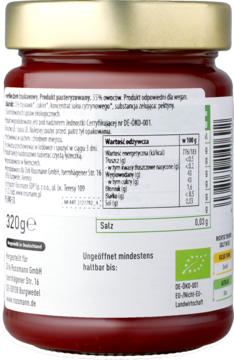 Tył słoika ekologicznego dżemu truskawkowego z białą etykietą: tabela wartości odżywczych i składniki.