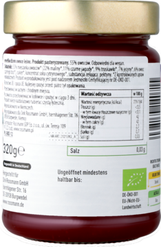 Tył słoika dżemu malinowo-jagodowego Rossmann Bio, biała etykieta z informacjami odżywczymi.