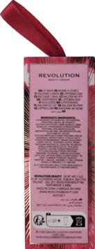 Tył różowego opakowania balsamu Revolution Candy Cane, z czerwoną wstążką i pełną listą składników.