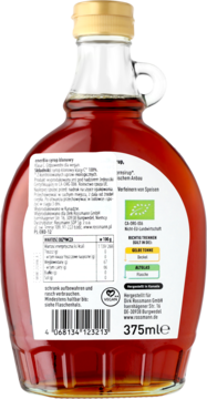 Tył szklanej butelki kanadyjskiego syropu klonowego klasy C, wegańskiego, z uchwytem i białą etykietą 375ml.