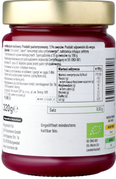 Tył słoika dżemu malinowego 320g. Biała etykieta z wartościami odżywczymi, składem i logo organicznym.