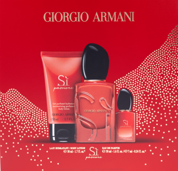 Czerwony zestaw Giorgio Armani Sì Passione: woda perfumowana 50ml, balsam 50ml i miniatura 7ml na tle w kropki.