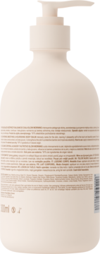 Tył kremowej butelki z pompką 300 ml, z czytelną etykietą zawierającą instrukcje i skład w wielu językach.