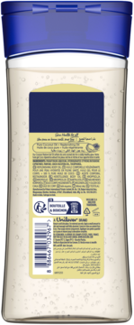 Tył butelki olejku do ciała Vaseline Coconut Restore, jasny płyn, niebieska zakrętka, kod kreskowy i składniki.