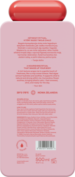 Tył różowego, odżywczego płynu do kąpieli 500ml z czerwoną nakrętką, widoczne składniki aktywne i opis.