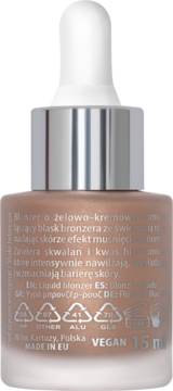 Tył butelki płynnego bronzera z pipetą, dającego efekt muśnięcia słońcem, w brązowo-złotym odcieniu.