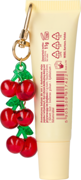 Aromatyczny balsam do ust Wibo z jojoba i witaminą E, beżowa tubka z brelokiem czerwonych czereśni.