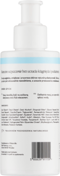 Tył białej butelki emulsji MOISTURE CALM z pompką. Widoczny skład, instrukcje, opis produktu po polsku i kod.
