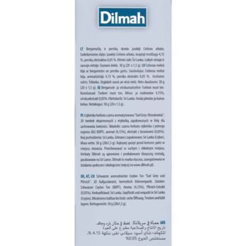 Pionowy bok opakowania herbaty Dilmah; białe tło, logo Dilmah u góry i wielojęzyczny opis składu.