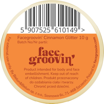 Okragły pojemnik Facegroovin' Cinnamon Glitter 10g do ciała i twarzy. Widok z góry, jasnopomarańczowa etykieta.