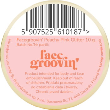Tył okrągłej etykiety Facegroovin' Peachy Pink Glitter 10g. Widoczny kod kreskowy, różowy tekst do ciała i twarzy.
