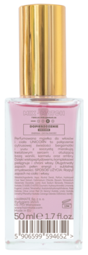 Mgiełka perfumowana UNICORN 50ml, tył różowej butelki ze złotą zakrętką, widoczny skład i kod kreskowy.