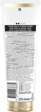 Tył białej tuby odżywki Pantene Hydration Recharge, złota nakrętka, tekst o miękkich i lśniących włosach.