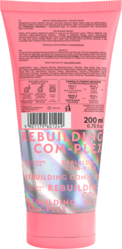 Tył różowej tubki maski REBUILDING COM-PLEX do włosów, z widocznymi instrukcjami i holograficznym napisem.