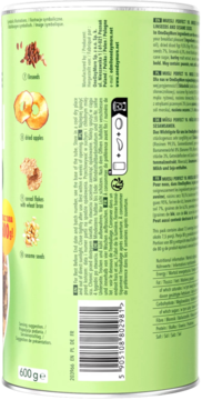 Tylna strona zielonej puszki musli z 10 składnikami, widoczne szczegóły: kod kreskowy i ilustracje z owocami i nasionami.