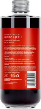 Tył butelki płynu do kąpieli Terapia Stymulująca 200ml, czerwona etykieta z białym tekstem i kodem EAN.