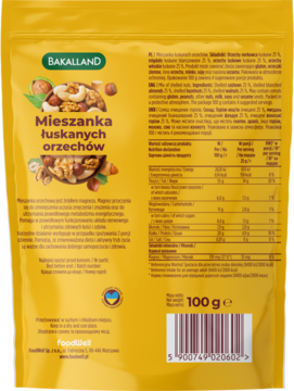 Tył żółtego opakowania Bakalland Mieszanka orzechów łuskanych 100g, z tabelą wartości odżywczych i składem.